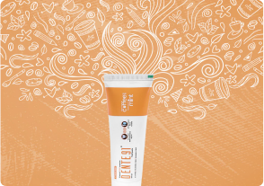 DentEzi caffeine toothpaste tube with coffee-themed doodles on an orange background